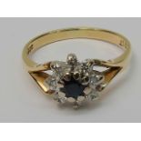 A sapphire and diamond cluster ring. Rou