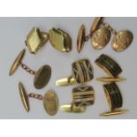 A pair of 9ct gold shield and toggle cuf