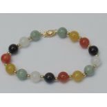 A multi coloured round bead bracelet of