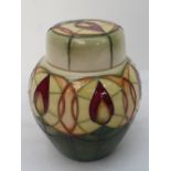A Moorcroft ginger jar and cover in cand