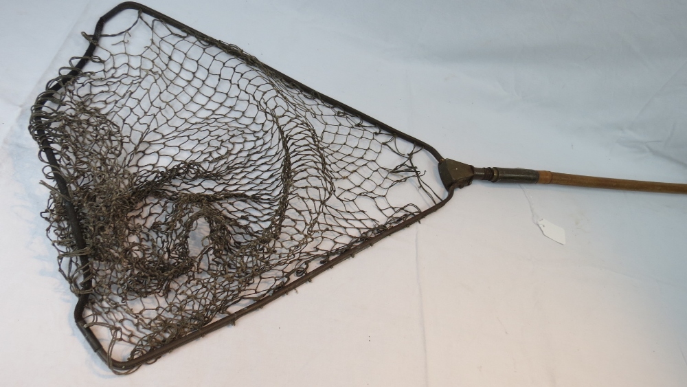 A vintage landing net, with brass foldin