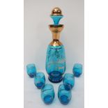 A Venetian gilt decorated blue glass dec