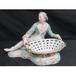 A pot pouring dish with a reclining gent