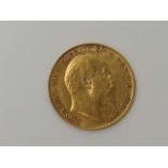 An Edward VII, 1909 gold half sovereign.