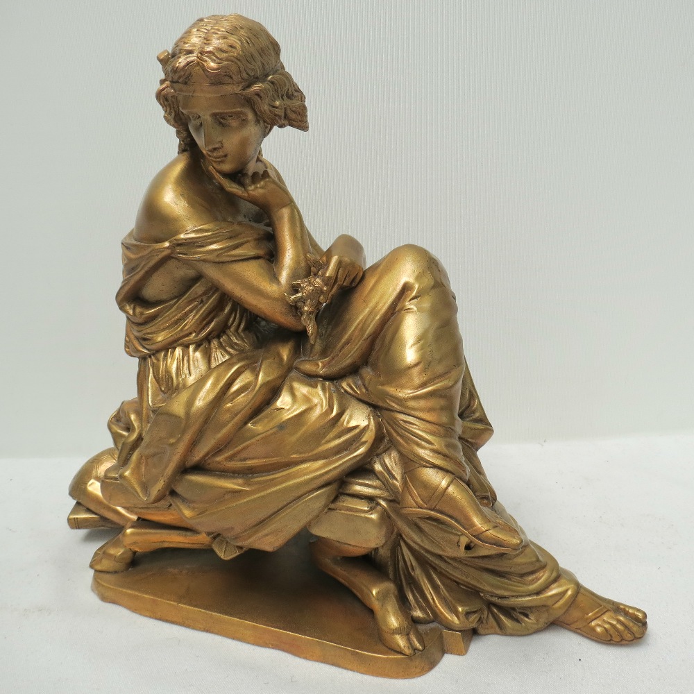 A large 19thC style gilt metal figure of