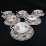A set of six Royal Doulton cups and sauc