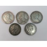 Five Spanish silver coins; a 1772 Charle