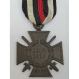 A 1914 -18 bronze cross having wreath an