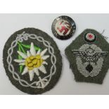 A party badge, Edelweiss and cap badge.