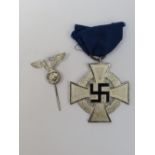 A German Faithful cross and lapel badge.