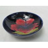 A Moorcroft bowl with Hibiscus design on