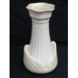 A green stamp Beleek fluted vase, tinted