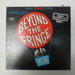 A copy Beyond The Fringe vinyl LP featuring the Great Train Robbery sketch, signed by both Bruce