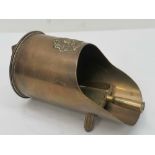 A trench art scuttle with Army Corp insi