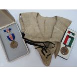 SAS shoulder holster and American medal