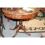 A VICTORIAN WALNUT CENTRE TABLE