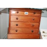 A SMALL PINE COLLECTOR'S CHEST TOGETHER WITH AND ELECTROTHERAPY DEVICE