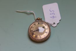 A LATE 19TH.C.FRENCH GOLD COLOURED KEYWIND FOB WATCH, THE BEZEL WITH SPLIT PEARL BORDERS.   £300-