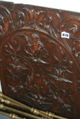 AN 18TH.C.CARVED WALNUT PANEL