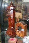 A 19TH.C.MINIATURE LONG CASE POCKET WATCH STAND OF DUTCH CLOCK FORM TOGETHER WITH A SIMILAR