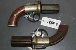 A 19TH.C.PERCUSSION PEPPERBOX REVOLVER TOGETHER WITH A SIMILAR EXAMPLE