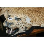 TWO ANTIQUE LEOPARDSKIN RUGS WITH MOUNTED HEADS