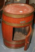 A LISTER BRASS BOUND COOPERED BARREL/CABINET CONSTRUCTED FROM THE TEAK OF HMS BIRMINGHAM
