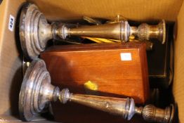 A BOX OF ASSORTED PLATEDWARES TO INCLUDE A PAIR OF CANDLESTICKS BY M.BOULTON & CO. 31cms HIGH.   £