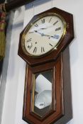 A VICTORIAN ROSEWOOD CASED DROP DIAL STRIKING WALL CLOCK TOGETHER WITH A 1920'S OAK CASED CHIMING