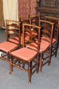 A SET OF SIX 18TH.C.COUNTRY MADE LADDER BACK CHAIRS