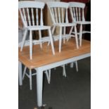A FRUITWOOD TOP PAINTED KITCHEN TABLE AND SIX CHAIRS