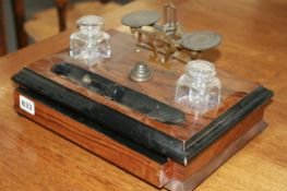 A VICTORIAN MAHOGANY DESKSTAND WITH INTEGRAL LETTER SCALE