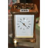 A 20TH.C.BRASS CASED STRIKING CARRIAGE CLOCK BY MATTHEW NORMAN