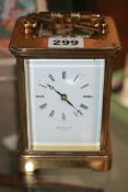 A 20TH.C.BRASS CASED STRIKING CARRIAGE CLOCK BY MATTHEW NORMAN