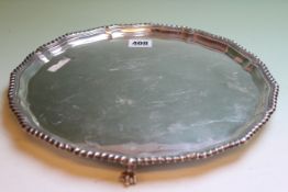 A SILVER SALVER WITH GADROON RIM, SHEFFIELD 1916, 32ozs.   £200-250