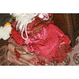 A QUANTITY OF CURTAIN FABRIC REMNANTS, BED VALANCES, TIE BACKS,ETC