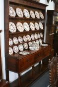 AN 18TH.C.OAK POT BOARD DRESSER WITH PLATE RACK