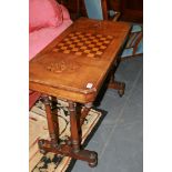 A VICTORIAN MAHOGANY AND INLAID GAMES TABLE