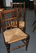 EIGHT LANCASHIRE SPINDLE BACK CHAIRS WITH RUSH SEATS