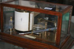 AN EARLY 20TH.C.OAK CASED RECORDING BAROGRAPH