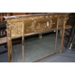 A REGENCY GILT OVERMANTLE MIRROR WITH TRIPLE BEVEL PLATES