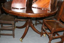 A 19TH.C.MAHOGANY AND WALNUT BREAKFAST TABLE