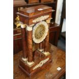 A MID 19TH.C.EMPIRE STYLE PORTICO CLOCK WITH FRENCH BELL STRIKE MOVEMENT AND ORMALU MOUNTS