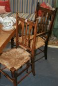 A SET OF EIGHT ARTS AND CRAFTS RUSH SEAT CHAIRS