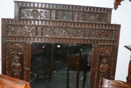 A 19TH.C.FLEMISH CARVED OAK PANEL FRAMED MIRROR