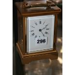 A 20TH.C.BRASS CASED CARRIAGE CLOCK WITH BELL STRIKE SIGNED TAYLOR & BLIGH