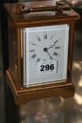 A 20TH.C.BRASS CASED CARRIAGE CLOCK WITH BELL STRIKE SIGNED TAYLOR & BLIGH