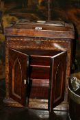 A LATE GEORGIAN WALNUT TABLE CABINET