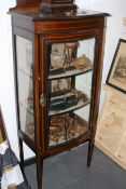 A MAHOGANY BOW FRONT DISPLAY CABINET