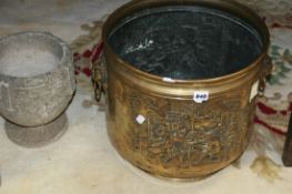 A LARGE BRASS LOG BIN AND A PLANTER